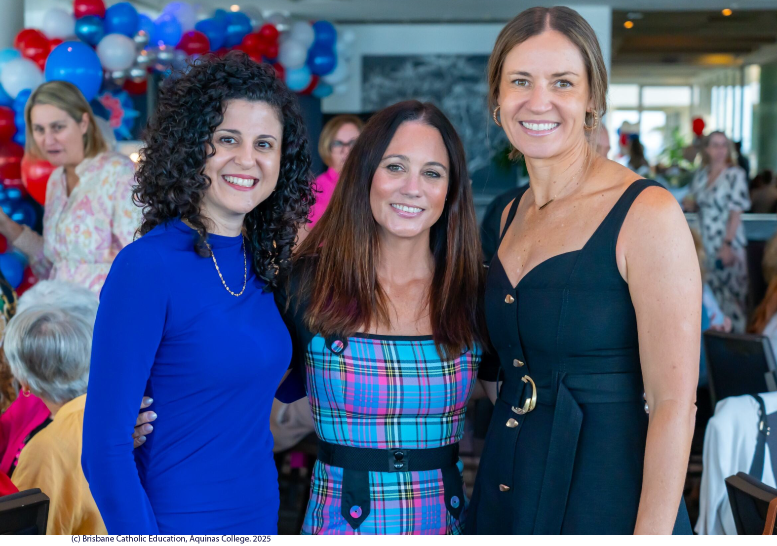 Three school mums' at an event